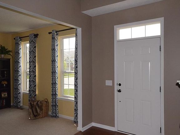 Transom window over Front Door is a nice touch.