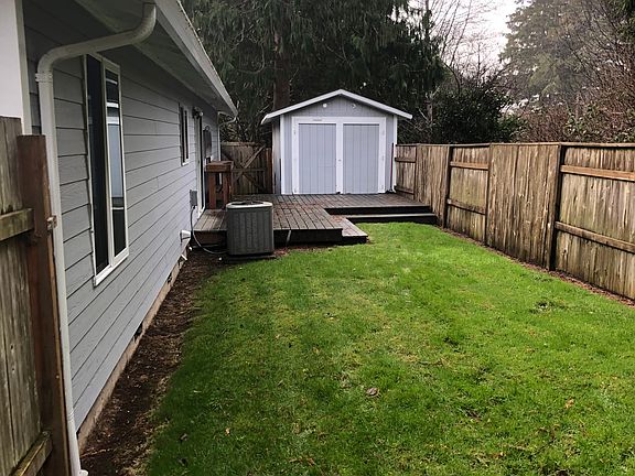 Small fenced backyard with deck. (storage shed is for home maintenance items; shed is not included in/as part of rental). Renter will have double car garage.