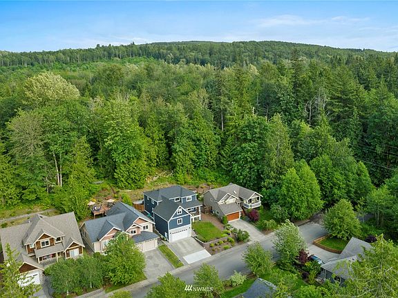 Aerial view of the home that backs up to Galbraith trail.  