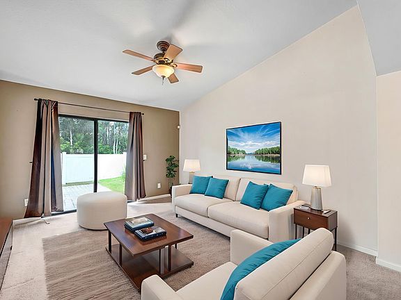Living Room w Cathedral ceiling
Walk out to Patio
Sunset view over Nature preserve