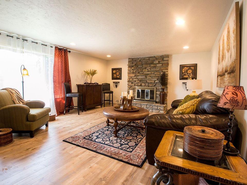 Spacious living room with gas fireplace.