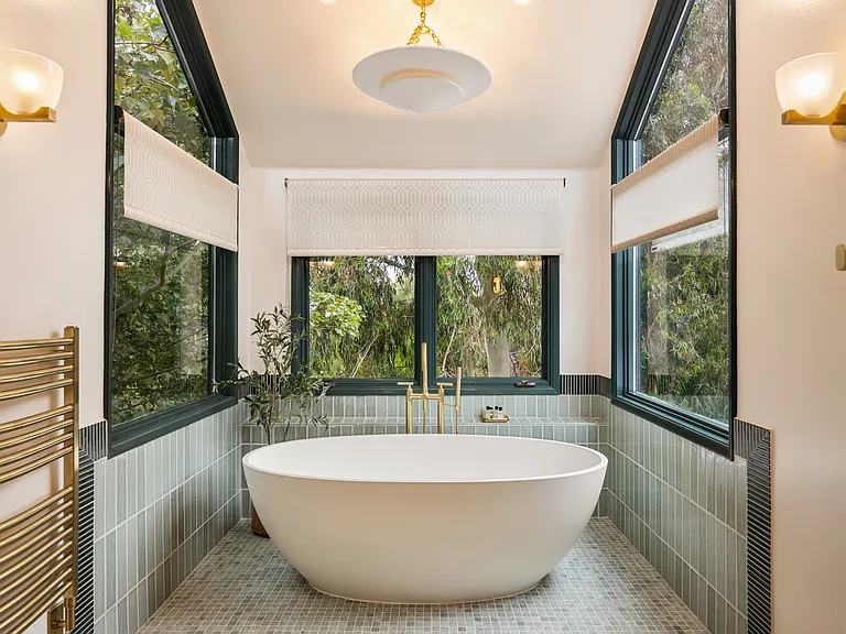 Enjoy a relaxing soak in the newly installed luxury soaking tub.