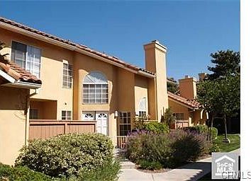 Front entry with gated patio.