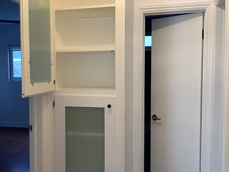 ADDITIONAL IN UNIT STORAGE/LINEN CLOSET AND SHELVES