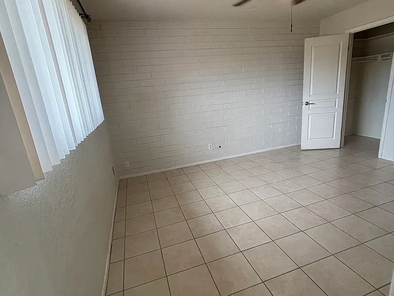 Primary bedroom with larger closet space.