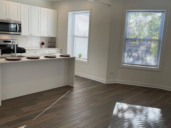 2nd image of 6233 S Langley Ave #2S