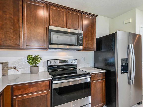 Kitchen with stainless steel appliances
