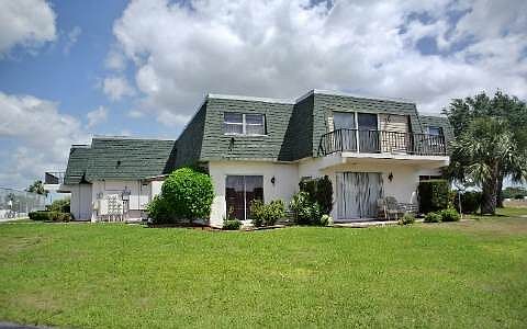 1st image of 102 Golf Villas Ct NW #102