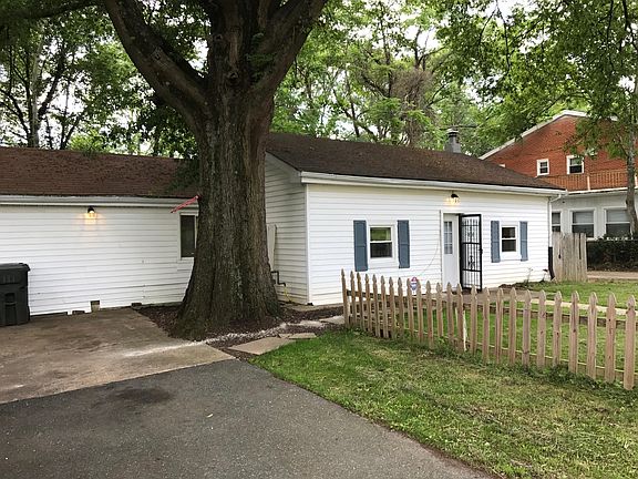 Driveway and fenced yard