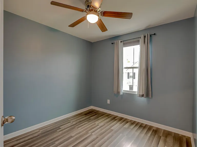 Third bedroom with hardwood floors