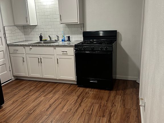 Clean and updated kitchen, new hardwood floors throughout
