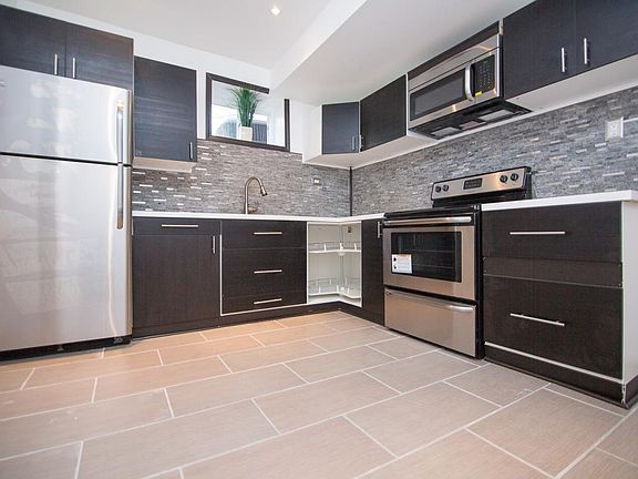 Modern Kitchen with brand new stainless steel appliances