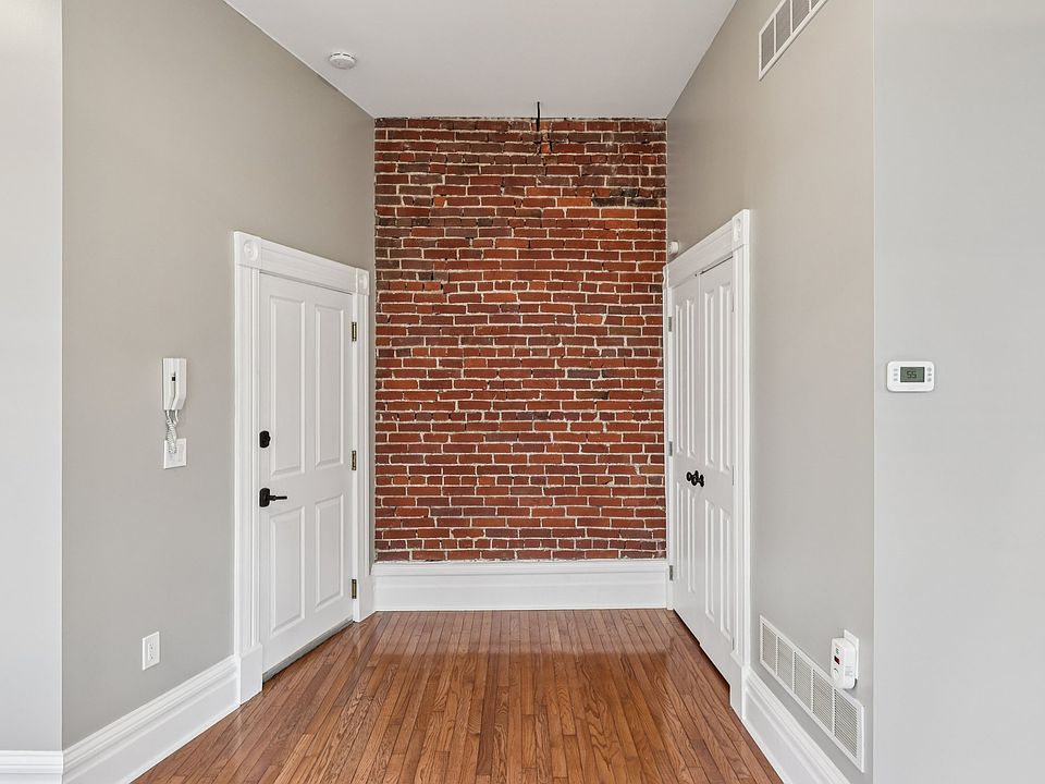 A large closet convenient to the entrance offers storage for coats, shopping bags and frequently used items.