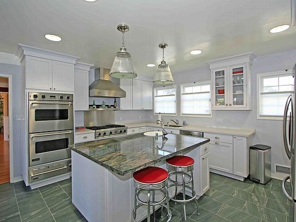 new luxury kitchen w/large marble center island & viking stove/ovens & more