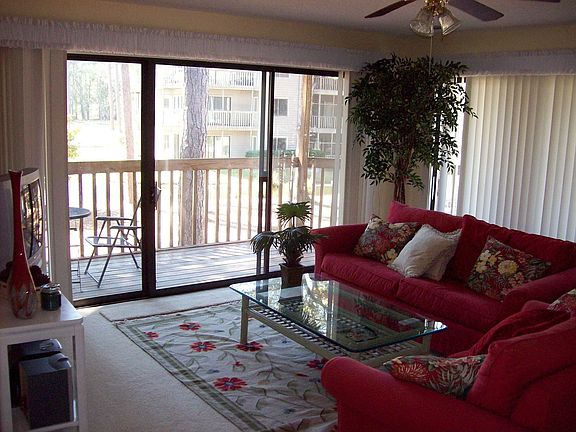 Open living area with view of golf course