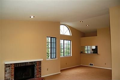 Living Room w/Wood Fireplace 