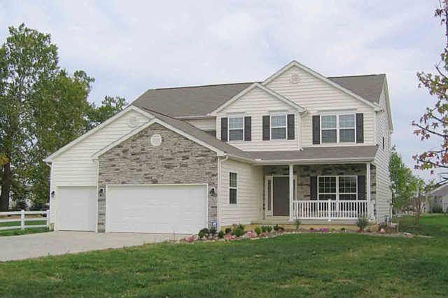 Large home with 3 car garage and front porch