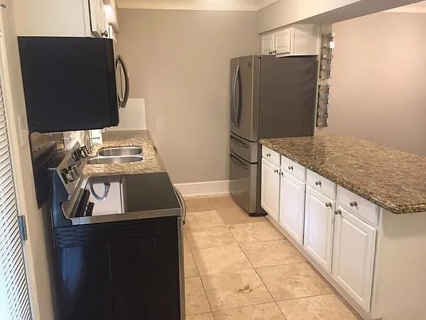 7730 Meadow Rd #106 — Photo 35