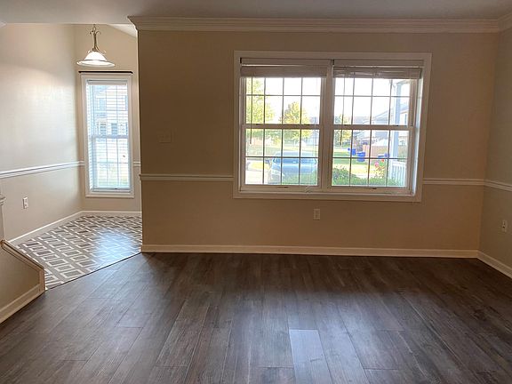 Large windows in living area with plenty of light coming in