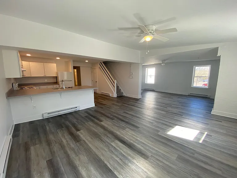 Dining room, kitchen, looking into living room