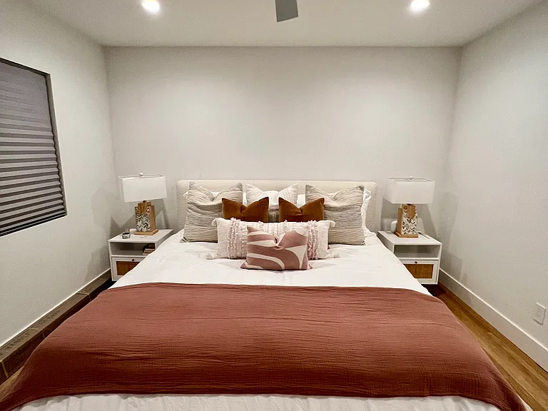 Primary Bedroom: Private primary suite with King Tempur-Pedic ProBreeze Hybrid mattress, adjustable bed base with built-in bluetooth