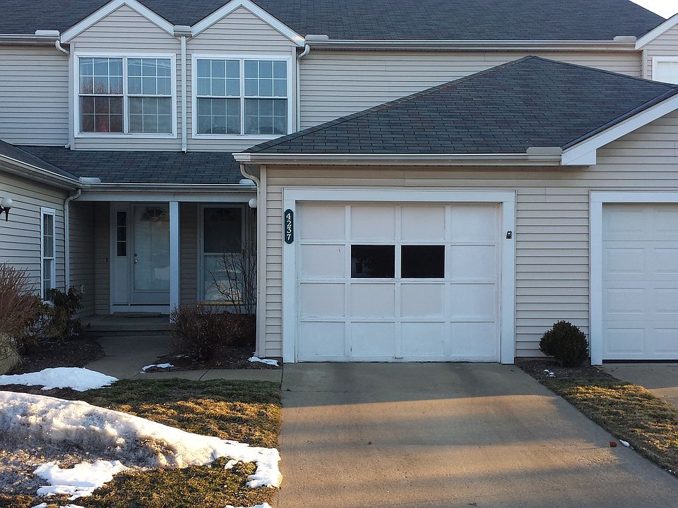 1 car attached garage with additional driveway parking