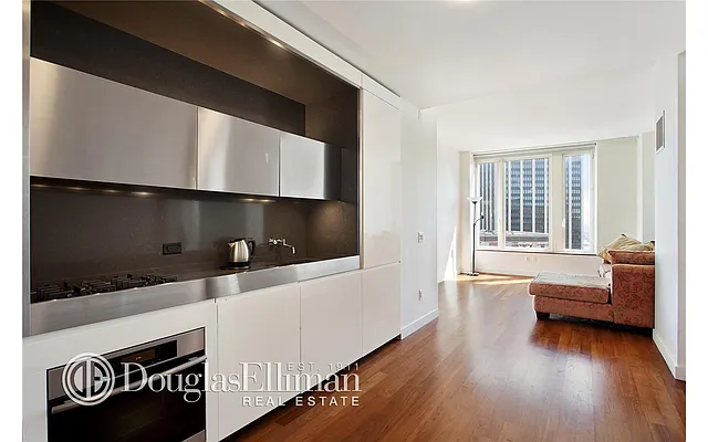 Sold by Douglas Elliman | media 18