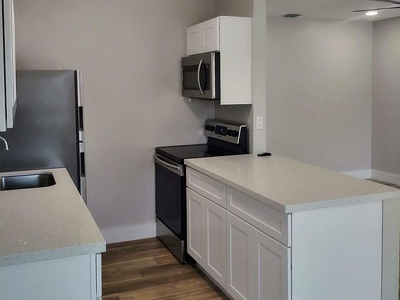 halogen glass cooktop and new designer quartz countertops!