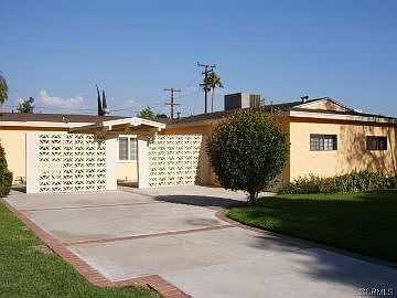 Front of home, studio separate behind home 