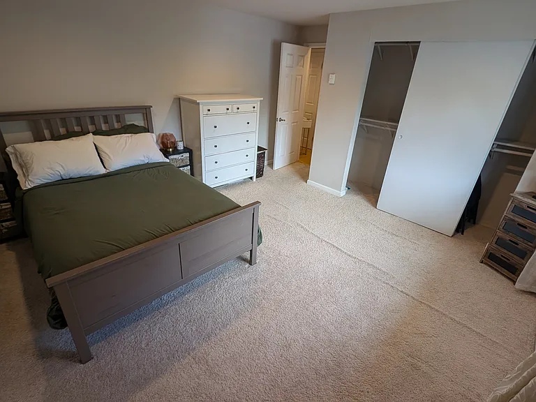 The bed in this image is a full size bed (54" x 75"), which is just a little smaller than a queen bed (60" x 80").