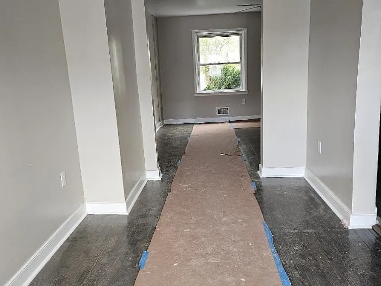 Standing in dining/kitchen area looking into living room