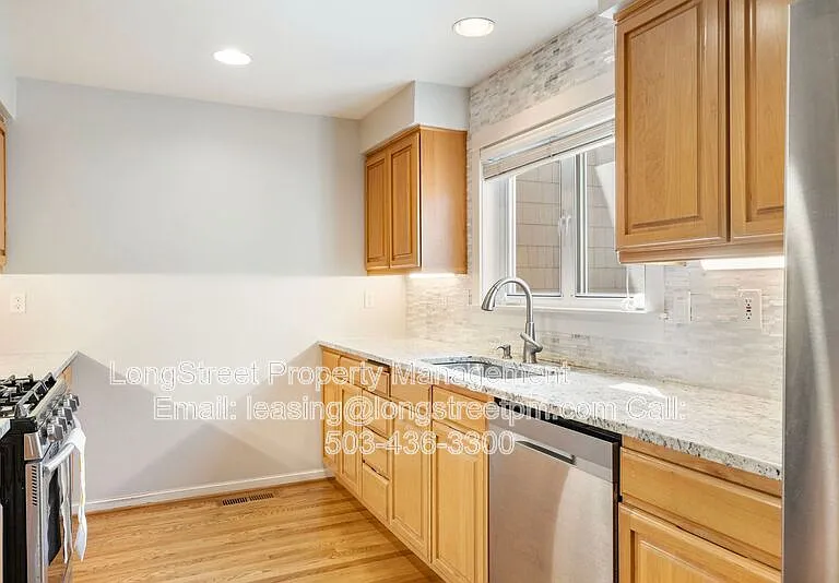 10247 NW Village Heights Dr — Photo 18