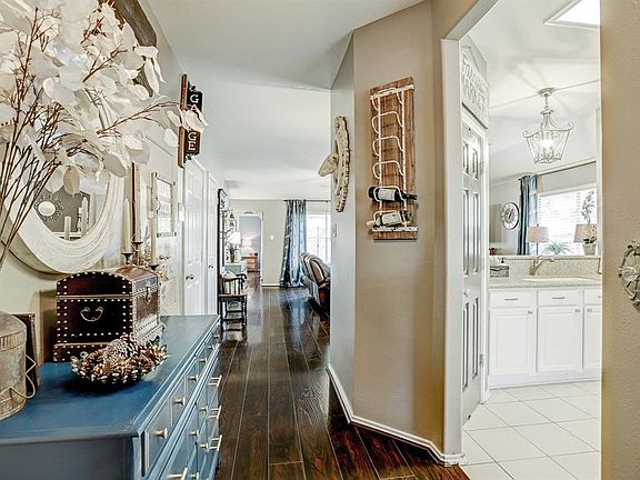 Light, bright, and welcoming entry bring you into the home.