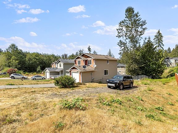 View from  the SE corner of the adjacent lot>