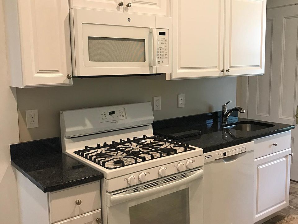 Kitchen cabinets with stove and dishwasher