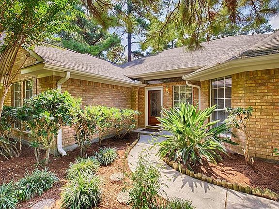 Welcoming path to the front door.  Note gutters in place.