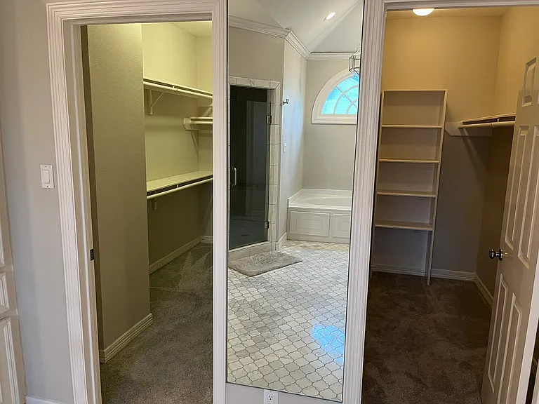 His and Her closets within master bath