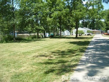 EXTRA LOT WITH 220 FEET OF WATERFRONT