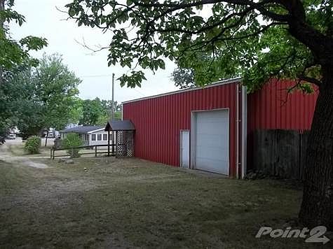 Home and 2 large pole barns