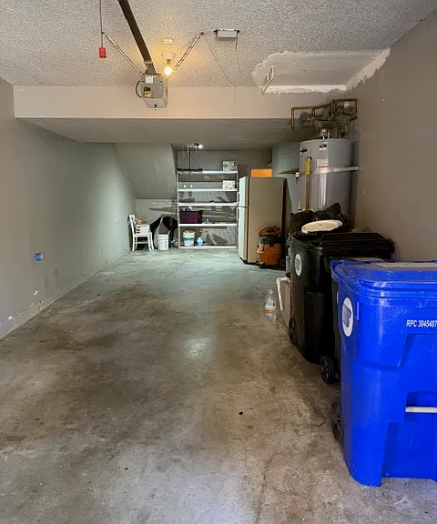 2-cars downstairs garage and laundry area. It has an additional refrigerator.