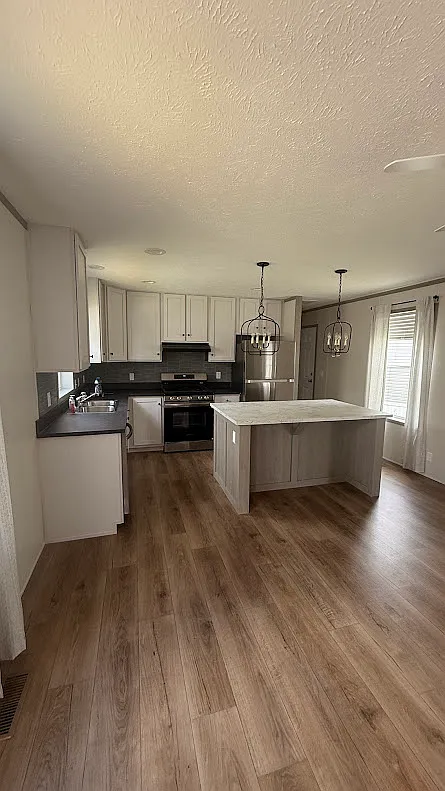 3 bed, 1056 sqft, $1,245 — Photo 2