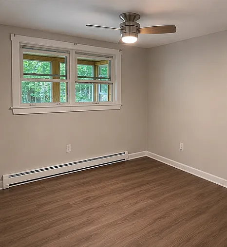 Bedroom #1 includes full closet, new fan, fresh paint.