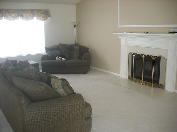 Great room, vaulted ceiling and WBF