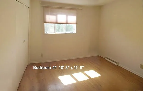 Bedroom #1 10'3" x 11'6".
