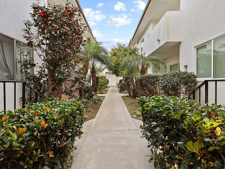Property Courtyard with Floral Landscaping