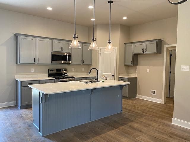 Kitchen area with island