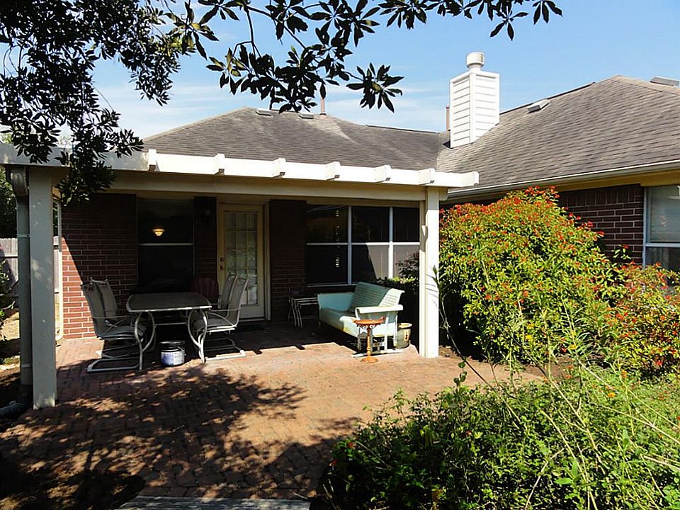 A view of the back of the house showing the fabulous covered patio