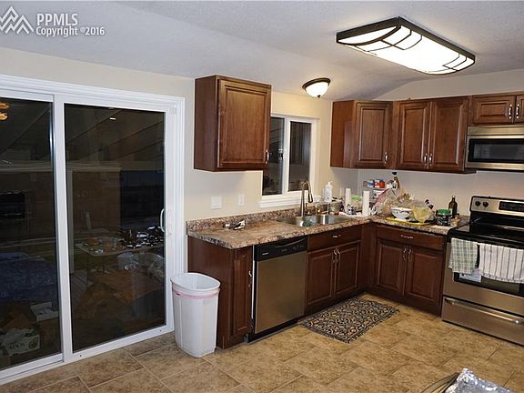 Ceramic Tile Floor, Newer Slider that Leads to a Covered Back Patio.