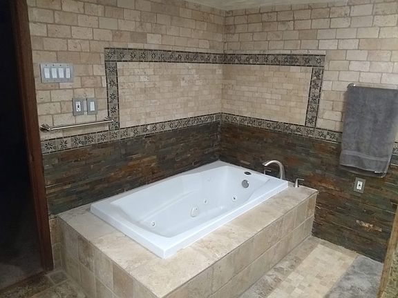 large tile enclode whirlpool