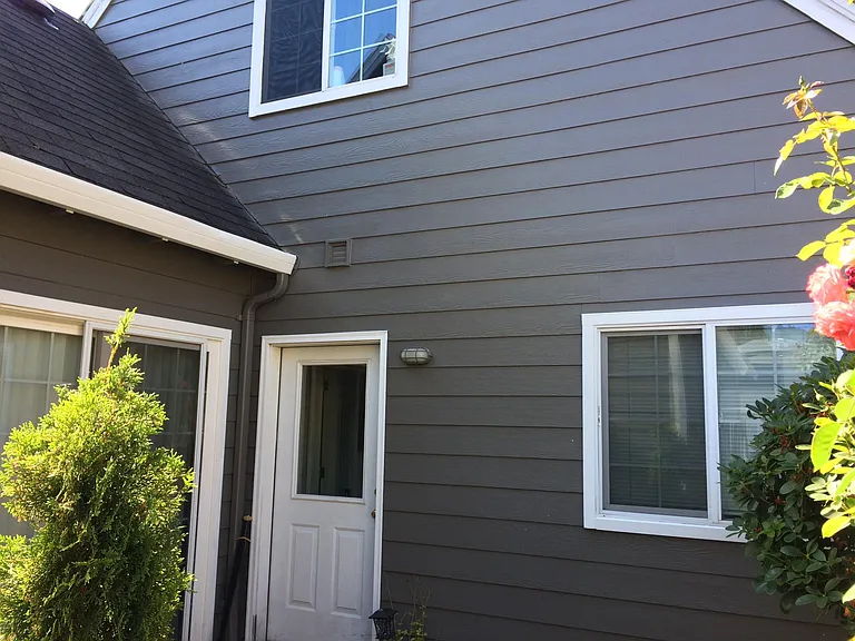 Courtyard entrance from private drive in the back